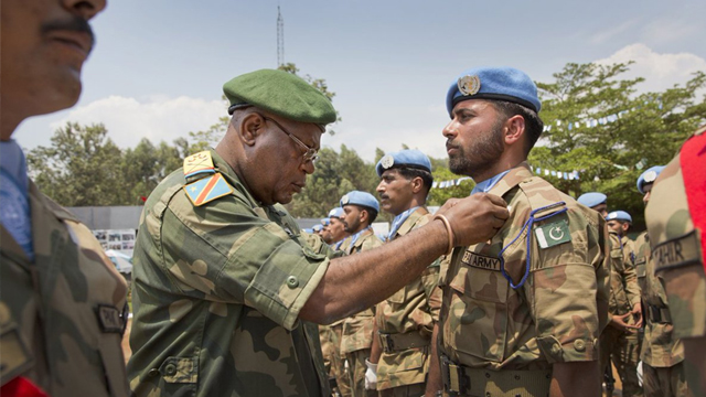 Pakistani soldiers being decorated after a tour of duty with the UN in the DR Congo